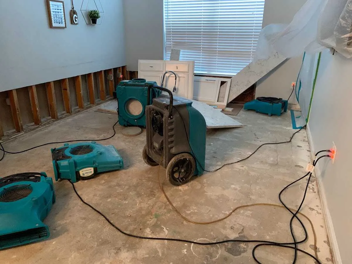 Dehumidifier in flood-cut room for Water Damage Restoration in Pewaukee